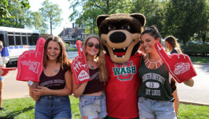 Students posing with the Wash U mascot