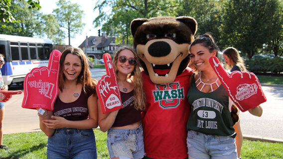 Students posing with the Wash U mascot