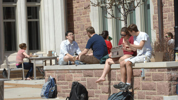 students outside talking