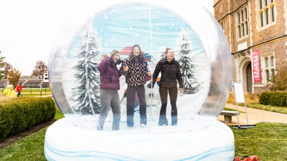 Students in a snow globe